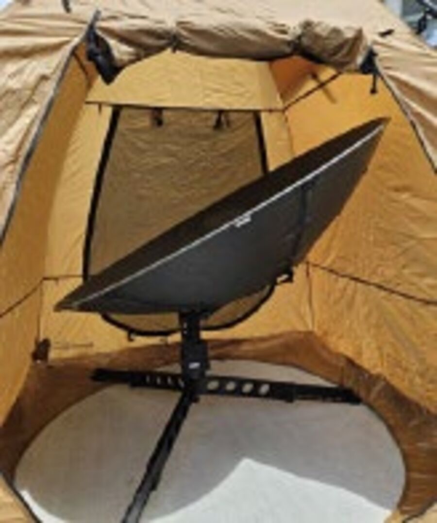 An RF Armor shielded satellite antenna enclosure deployed in the field.